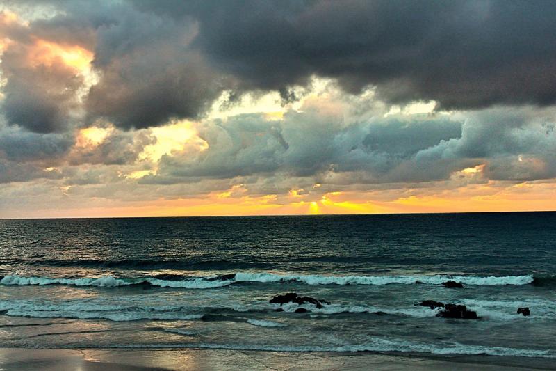 Surfers at sunset in San Diego 2015 by Gregg Webber